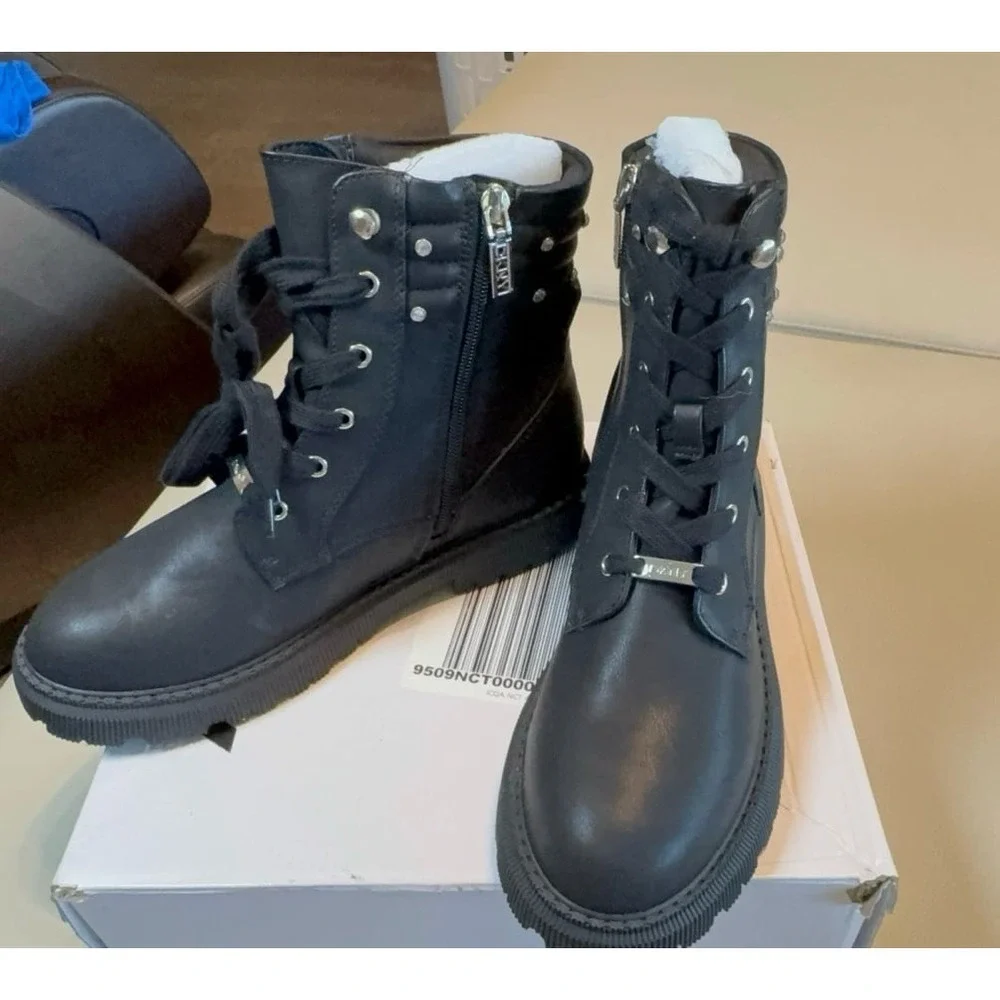 Youth girls size 5 DKNY black boots.